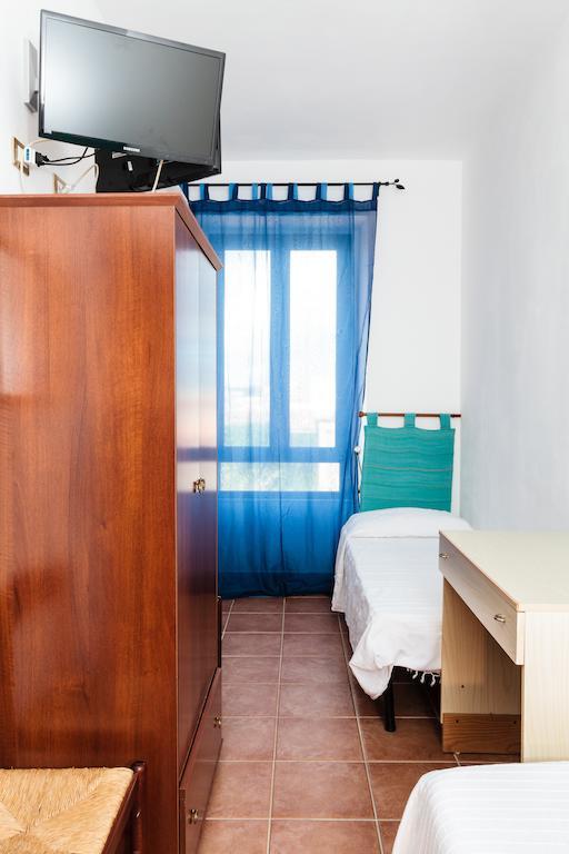 La Mezzanella Guesthouse بورتو توريس الغرفة الصورة